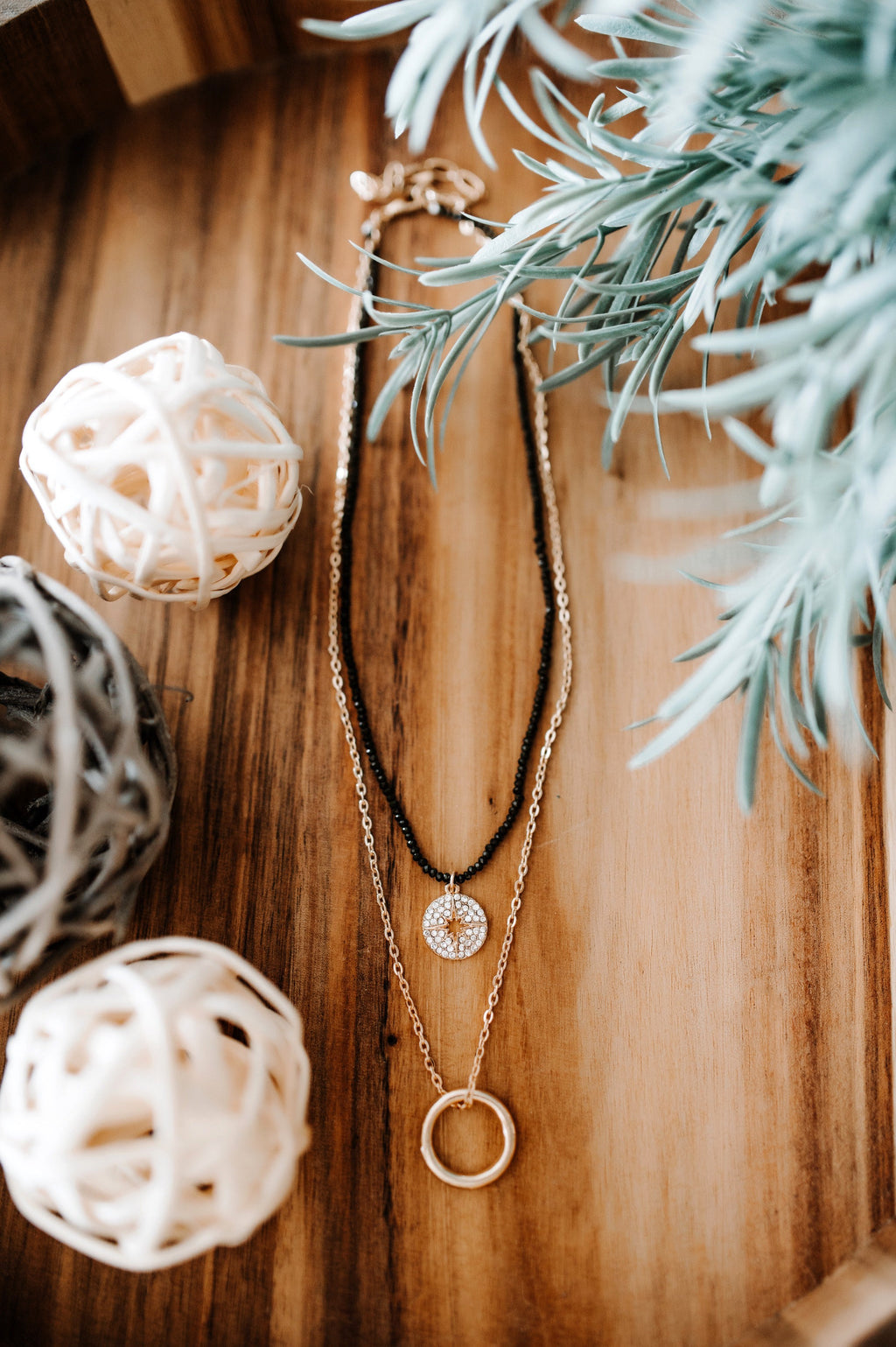 Layered Necklace With Sunburst & Ring Pendant In Gold & Black