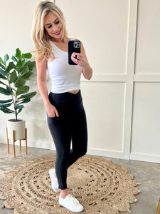 Crossover Capri Leggings With Pockets In Black By Anchored Arrows